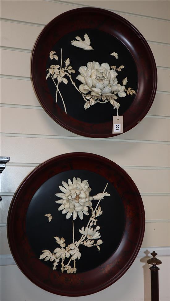 A pair of Japanese ivory relief plaques diameter 46cm